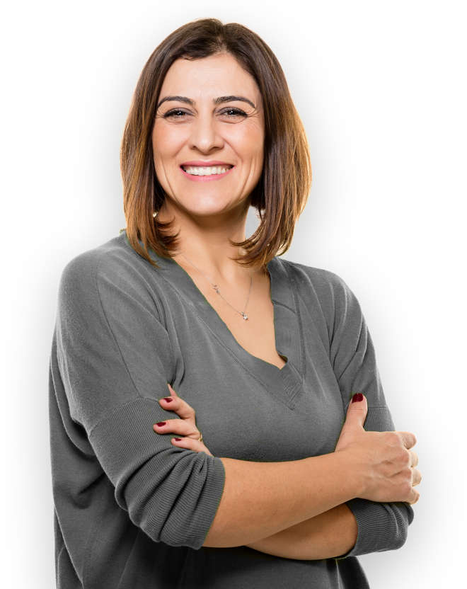 smiling woman with arms crossed